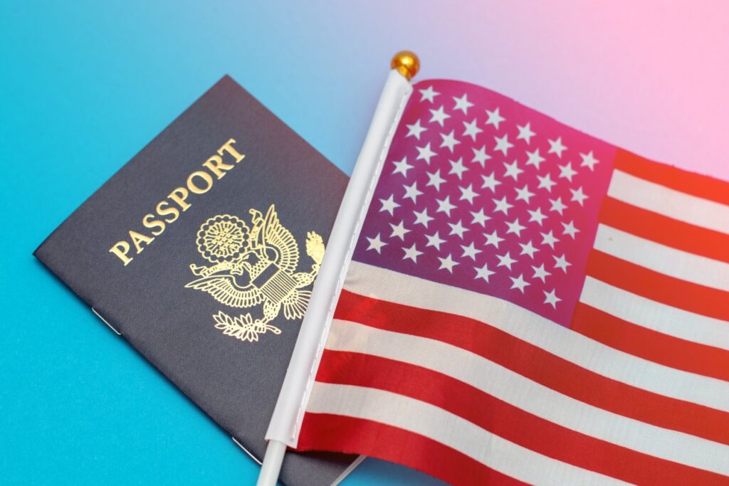 Passport services at Expert Multi-Services. Passport with USA flag.