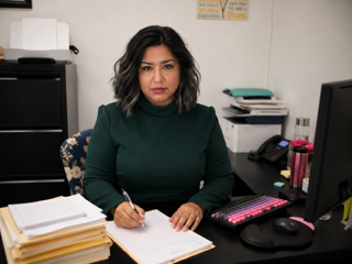 Rosa Gafare, registered and bonded Legal Document Assistant, preparing divorce paperwork in San Jose